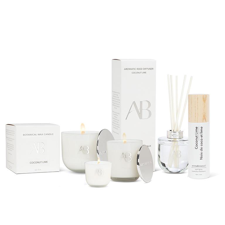 Collection of candles and diffusers with branding on a white background