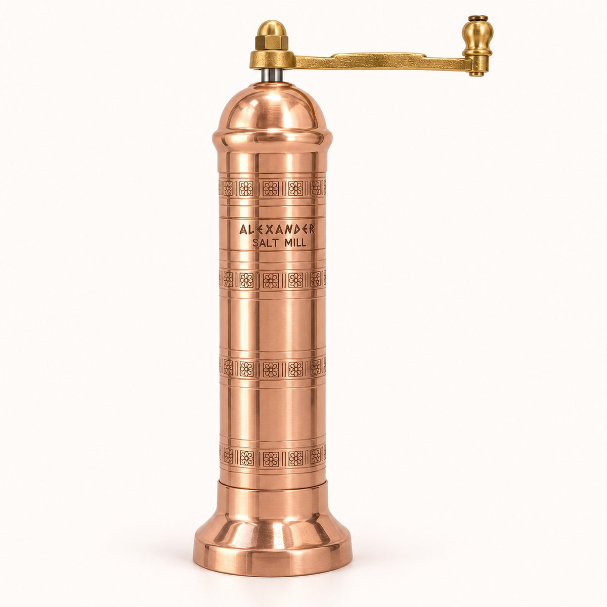 A copper and brass hand-crank salt mill grinder with 'ALEXANDER SALT MILL' engraved on the front, set against a plain white background.