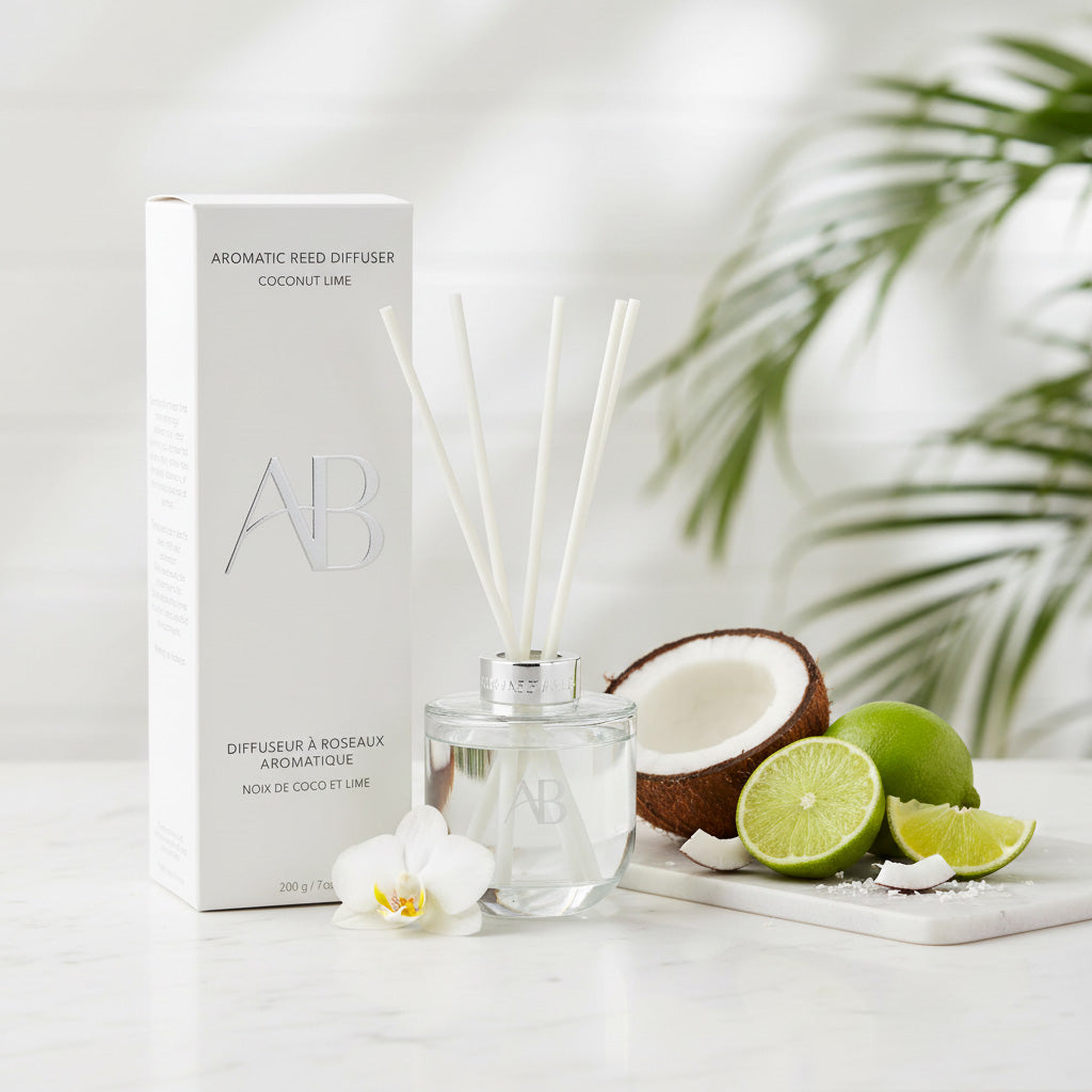 Aromatherapy diffuser with coconut, lime, and a box on a white surface.