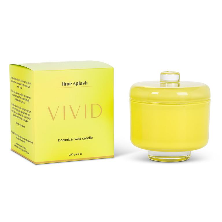 Yellow candle with lid and packaging labeled 'Vivid Lime Splash' on a white background