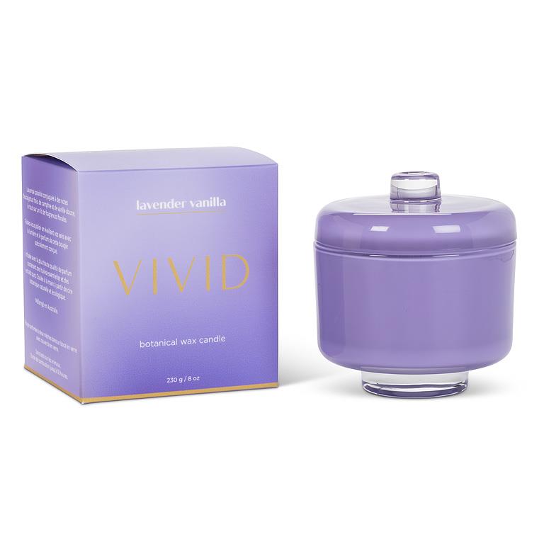 Purple candle with matching box labeled 'Vivid' on a white background