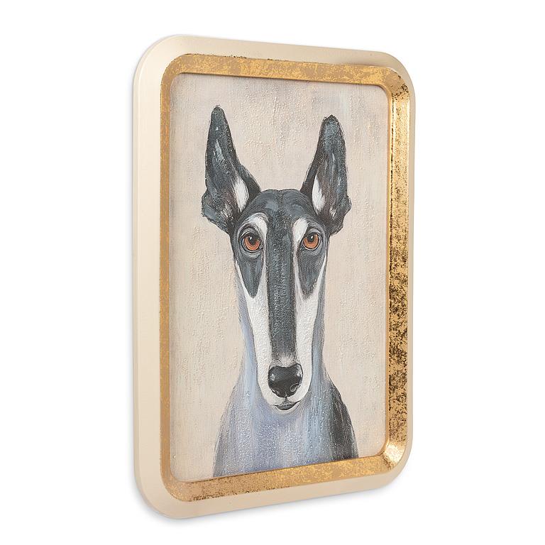 Framed artwork of a dog's face with a gold frame on a white background